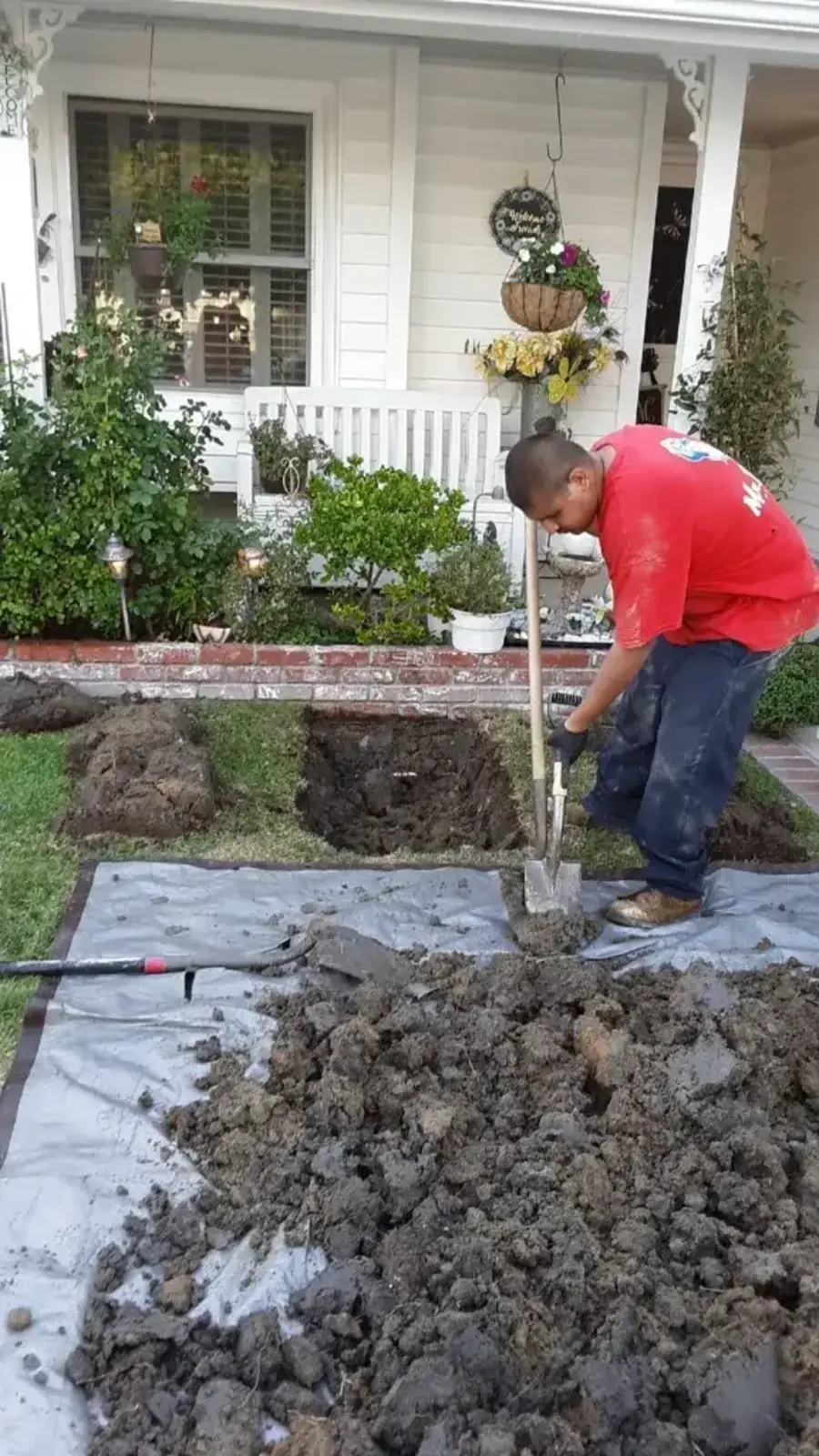 Technician working carefully on sewer repair